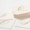 Caspari Engagement Party|Paper Cocktail Napkins|White Pearl & Gold Paper Linen Single Initial Boxed Cocktail Napkins - 30 Per Box